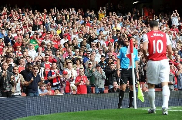 Arsenal's Robin van Persie Receives a Hero's Welcome as He Prepares to Take a Free Kick Against Bolton Wanderers in the Premier League, Resulting in a 3-0 Victory at Emirates Stadium