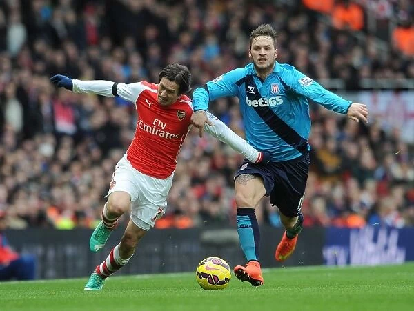 Arsenal's Rosicky Fouls by Arnautovic in Intense Arsenal v Stoke Clash (2014-15)