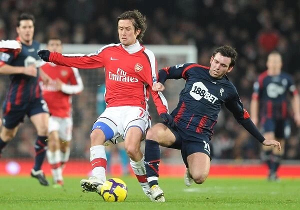 Arsenal's Rosicky Outshines Davies in Exciting 4-2 Victory over Bolton