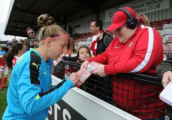 Arsenal's Sari van Veenendaal Signs Autographs After FA Cup Match Against Tottenham Ladies