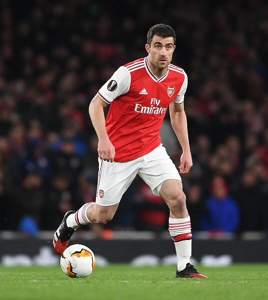 Arsenal's Sokratis in Action against Olympiacos in Europa League Clash