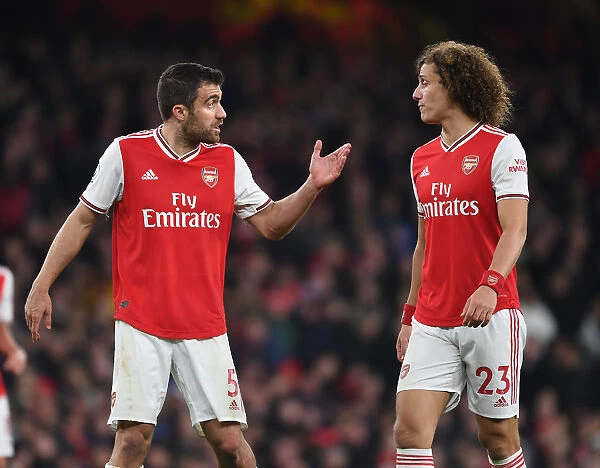 Arsenal's Sokratis and David Luiz in Action: A Defensive Duo at Emirates Stadium (2019-20)