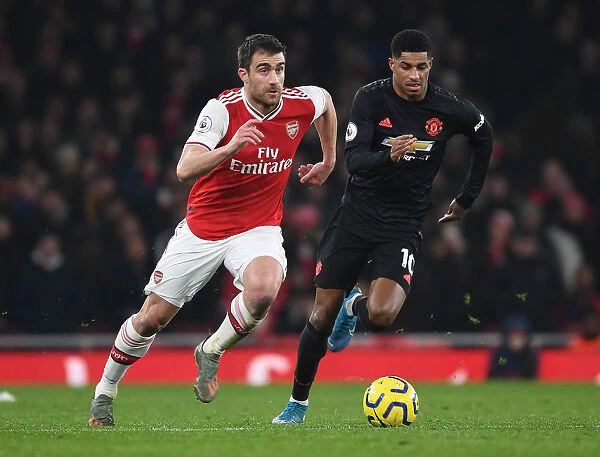 Arsenal's Sokratis Outmuscles Manchester United's Rashford in Intense Premier League Clash