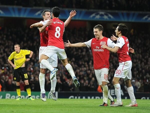 Arsenal's Star Strikers: Van Persie, Arteta, Ramsey, and Benayoun Celebrate Goals Against Borussia Dortmund in the 2011-12 Champions League