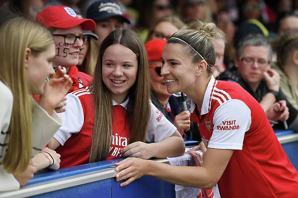 Arsenal's Steph Catley Greets Fan After Chelsea Showdown in FA Women's Super League (2022-23)
