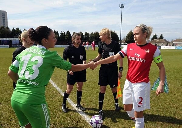 Arsenal's Steph Houghton and Nadine Kessler of VfL Wolfsburg Exchange Pre-Match Greetings in UEFA Women's Champions League Semi-Final