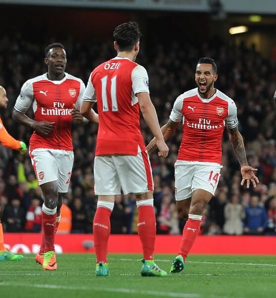 Arsenal's Theo Walcott, Danny Welbeck, and Mesut Ozil Celebrate Goals Against West Ham United