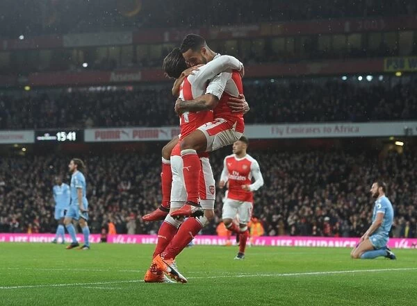 Arsenal's Theo Walcott and Hector Bellerin Celebrate Goal Against Stoke City (2016-17)