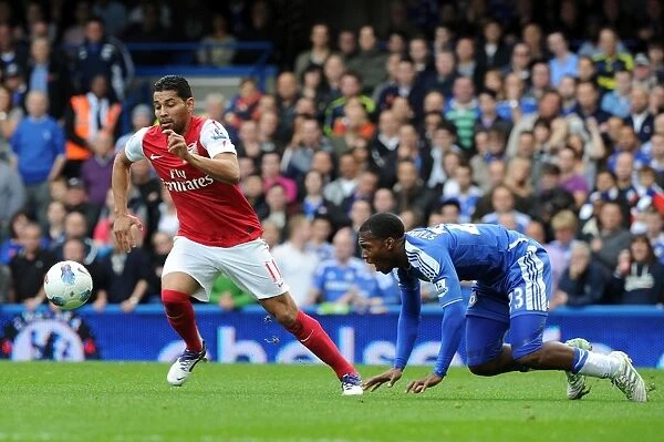 Arsenal's Thrilling 5-3 Comeback Victory over Chelsea in the Premier League: Andre Santos and Dean Sturridge Clash at Stamford Bridge, October 2011