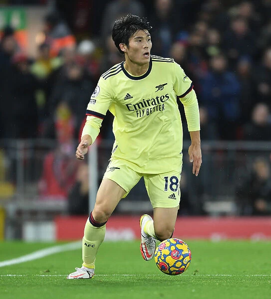 Arsenal's Tomiyasu Stands Strong: A Defiant Performance at Anfield (2021-22)