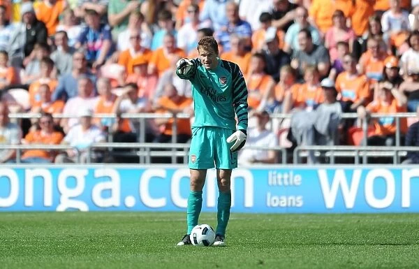 Arsenal's Triumph: Jens Lehmann Leads the Gunners to a 3-1 Victory over Blackpool in the Premier League