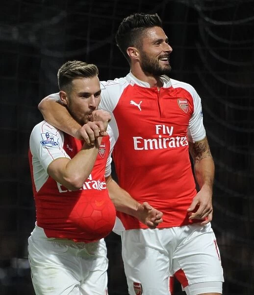 Arsenal's Triumph: Ramsey and Giroud Celebrate Goals Against Watford (2015 / 16)