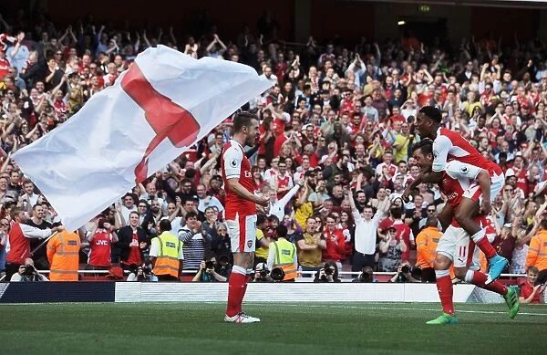 Arsenal's Triumph: Ramsey, Ozil, and Welbeck Celebrate Goals Against Everton (2016-17)