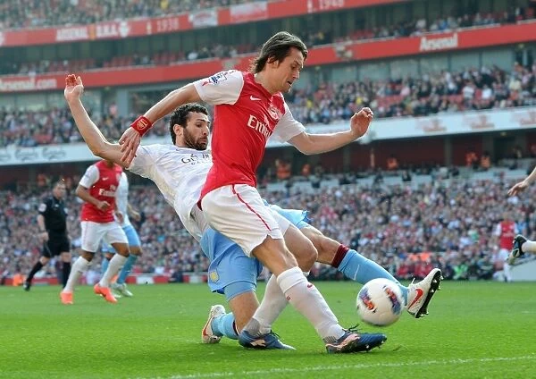 Arsenal's Triumph: Rosicky's Brilliance Leads to a 3-0 Victory over Aston Villa