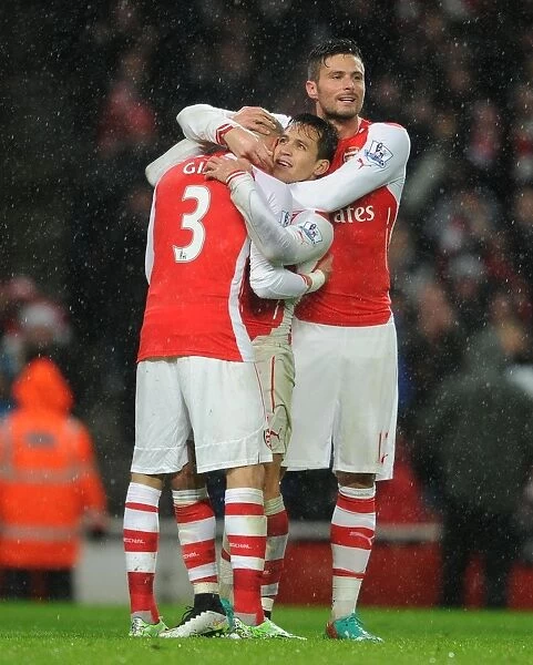Arsenal's Triumph: Sanchez, Cazorla, and Giroud Celebrate First Goal vs. Queens Park Rangers (2014-15)