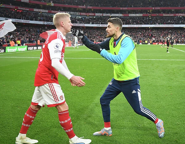 Arsenal's Triumph: Zinchenko and Jorginho Celebrate Third Goal vs. AFC Bournemouth (2022-23)