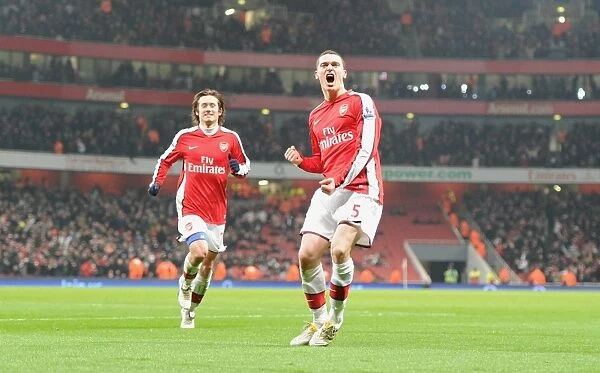 Arsenal's Triumphant Moment: Vermaelen and Rosicky's Unforgettable Goal Celebration (4-2) vs. Bolton Wanderers, 2010