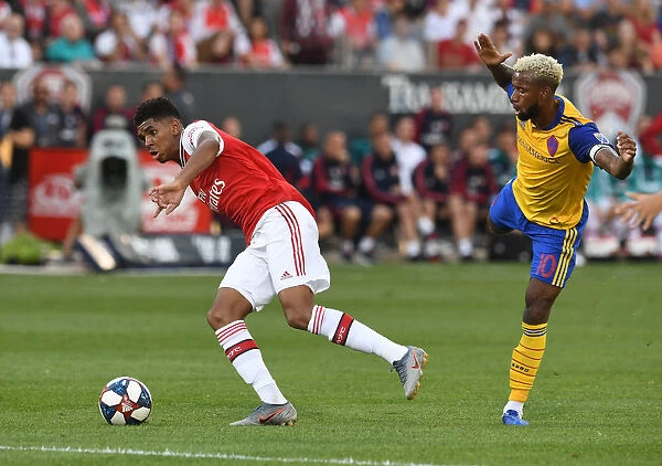 Arsenal's Tyreece John-Jules vs. Kellyn Acosta: A Battle in the 2019 Arsenal vs. Colorado Rapids Pre-Season Clash