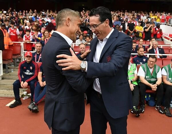 Arsenal's Unai Emery and Olympique Lyonnais Silvinho: A Pre-Match Encounter at the Emirates Cup 2019