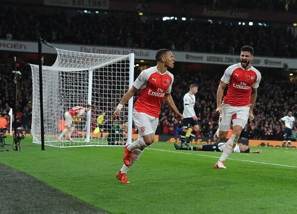 Arsenal's Unforgettable Victory: Gibbs and Giroud Celebrate Goal Against Tottenham