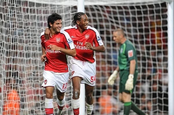 Arsenal's Unstoppable Duo: Carlos Vela and Sanchez Watt's 2-0 Goal Celebration vs. West Brom in Carling Cup