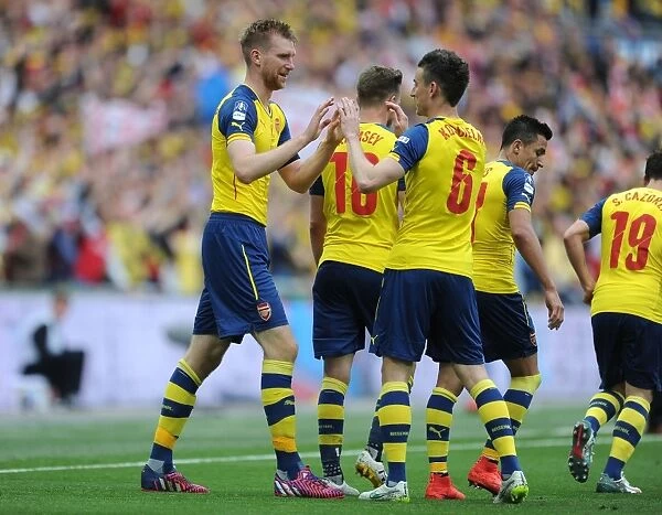 Arsenal's Unstoppable Duo: Per Mertesacker and Laurent Koscielny Celebrate FA Cup Victory