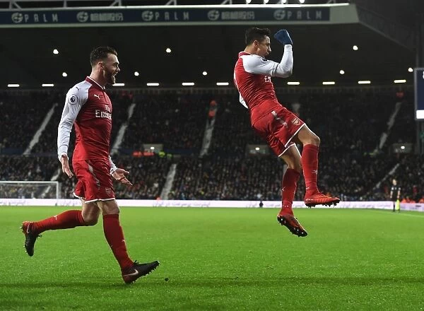 Arsenal's Unstoppable Duo: Sanchez and Chambers - Celebrating Glory: A Memorable Moment as Arsenal Scores Against West Bromwich Albion (2017-18)