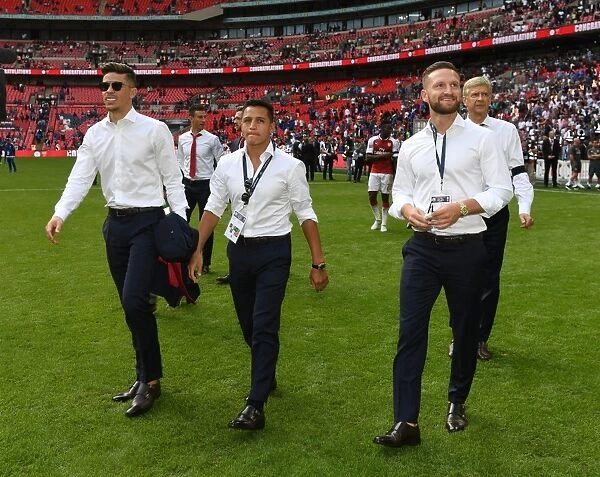 Arsenal's Unstoppable Trio: Gabriel, Sanchez, and Mustafi Unite for FA Community Shield Battle Against Chelsea (2017-18)