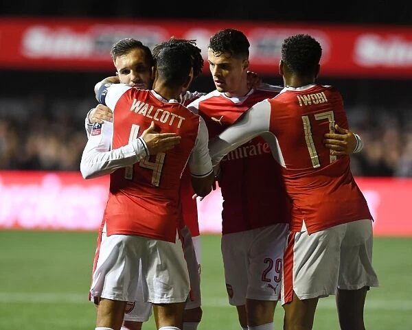 Arsenal's Upset Victory over Sutton United in FA Cup: Perez, Walcott, Xhaka, and Iwobi Celebrate
