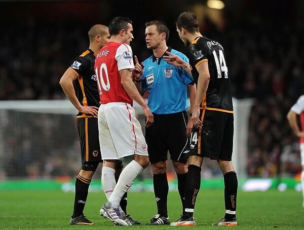 Arsenal's Van Persie Clashes with Wolves Johnson during Premier League Encounter (2011-2012)