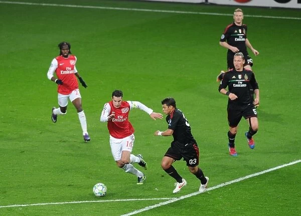 Arsenal's Van Persie and Gervinho Clash with AC Milan's Thiago Silva in 2012 Champions League Showdown