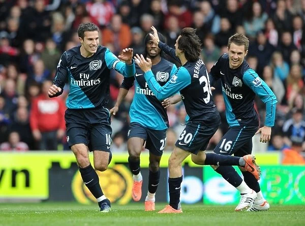 Arsenal's Van Persie, Gervinho, Ramsey, and Benayoun Celebrate Goal Against Stoke City (2011-12)