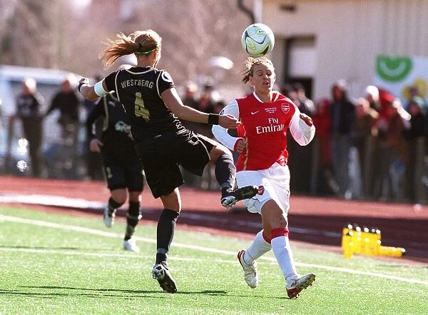 Arsenal's Victory Over Umea: Julie Fleeting and Karolina Westberg in Action during the 2006-07 Women's UEFA Cup