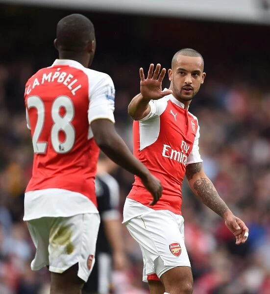 Arsenal's Walcott and Campbell Celebrate Goals Against Watford (April 2016)