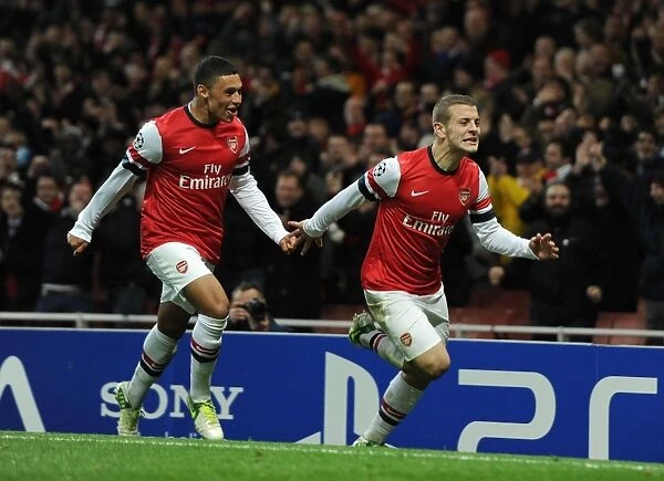 Arsenal's Wilshere and Oxlade-Chamberlain Celebrate Goal Against Montpellier (2012-13)