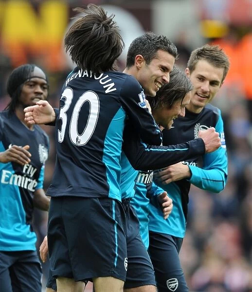 Arsenal's Winning Moment: Van Persie, Benayoun, Rosicky, and Ramsey Celebrate Goal vs Stoke City (2012)