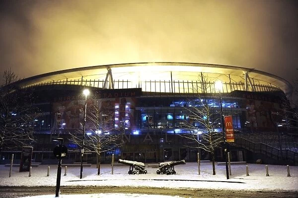 Arsenal's Winter Battlefield: Snowy Emirates Stadium in the Premier League