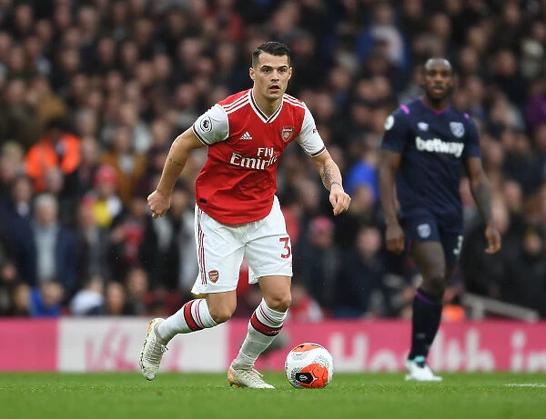 Arsenal's Xhaka in Action Against West Ham United - Premier League 2019-2020