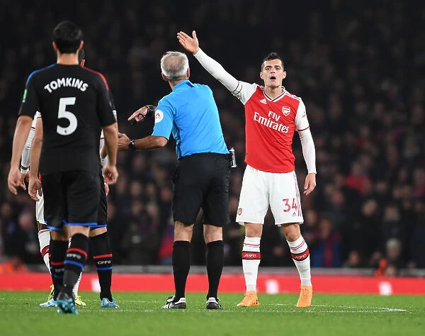 Arsenal's Xhaka Argues with Referee during Arsenal vs. Crystal Palace Clash