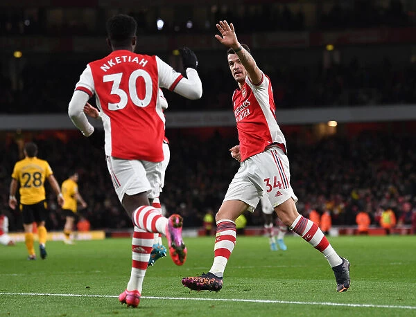 Arsenal's Xhaka and Nketiah Celebrate First Goal Against Wolverhampton Wanderers in 2021-22 Premier League
