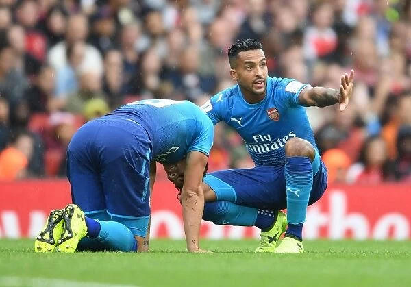 Arsenal's Xhaka and Walcott in Action against Benfica at Emirates Cup