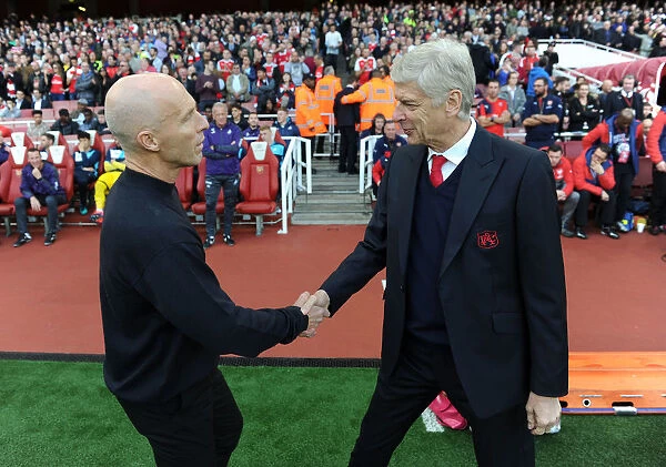 Arsene Wenger and Bob Bradley: A Pre-Match Handshake at Arsenal vs Swansea City, Premier League 2016-17