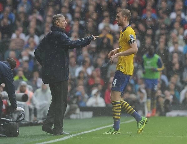 Arsene Wenger Consults Per Mertesacker During Fulham vs. Arsenal, 2013-14 Premier League