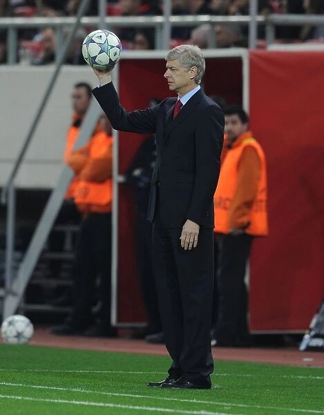 Arsene Wenger: Focused at Olympiacos vs Arsenal, UEFA Champions League (December 2011)