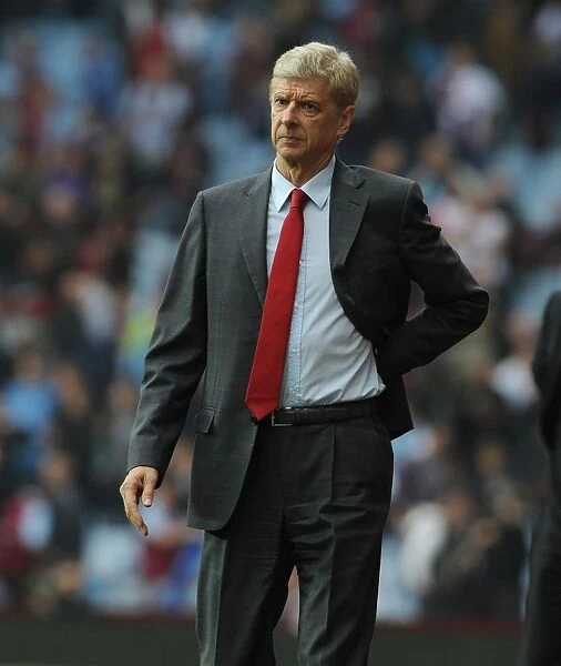 Arsene Wenger Leads Arsenal Against Aston Villa in Premier League (2014-15)