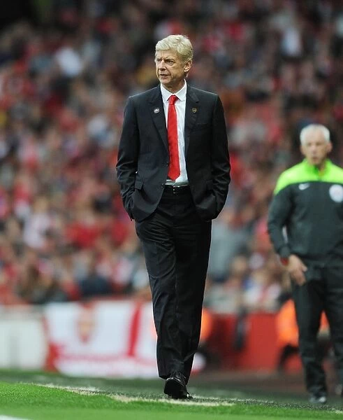 Arsene Wenger Leads Arsenal in Premier League Clash Against Hull City (2014-15)