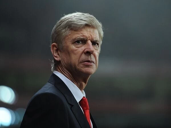 Arsene Wenger Leads Arsenal in UEFA Champions League Match Against Borussia Dortmund (2014-15)