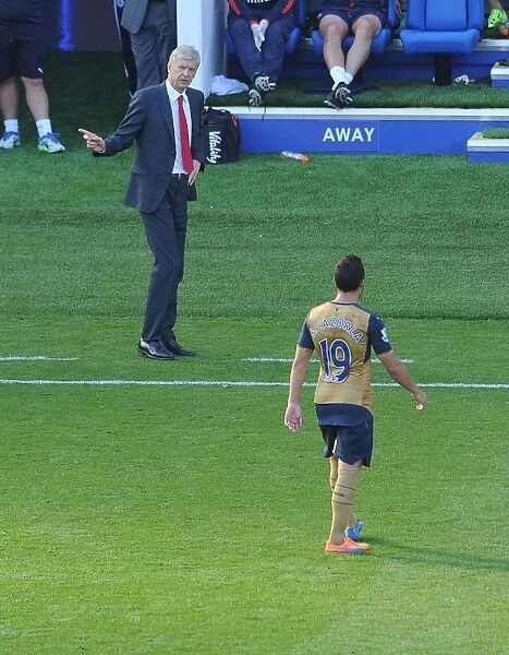 Arsene Wenger and Santi Cazorla: A Moment of Connection during the Leicester City vs. Arsenal Match, 2015