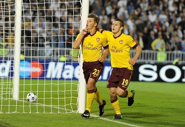 Arshavin and Wilshere: Celebrating Arsenal's First Goal in Champions League Victory over Partizan Belgrade