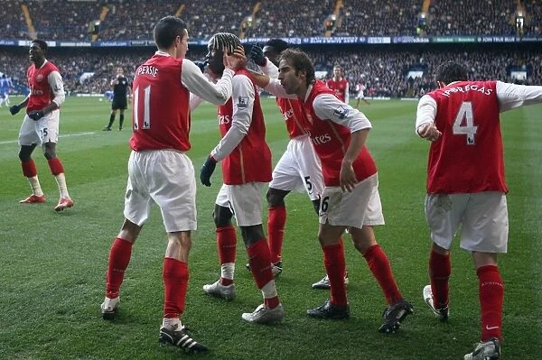 Bacary Sagna celebrates scoring Arsenals goal with Robin van Persie